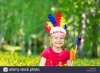 little-funny-girl-playing-native-american-in-summer-park-HPWXKW.jpg